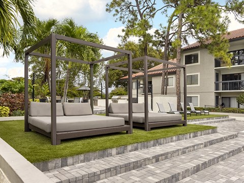 a rendering of a patio with couches and lawn furniture